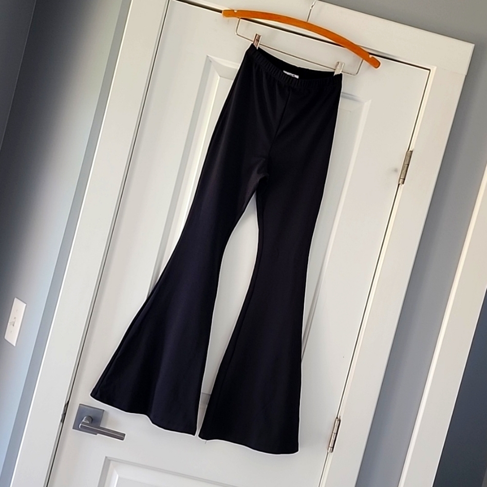 NWOT...Boyed black, very flared, fitted at knee, high rise legging pant!